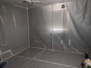 image of plastic wrapped bedroom, no furniture